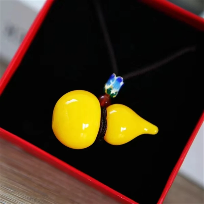 Handmade thermoplastic glaze chicken oil yellow calabash tabletop decoration, a gift of hand woven treasure bottle rope
Handmade thermoplastic glaze chicken oil yellow calabash tabletop decoration, a gift of hand woven treasure bottle rope