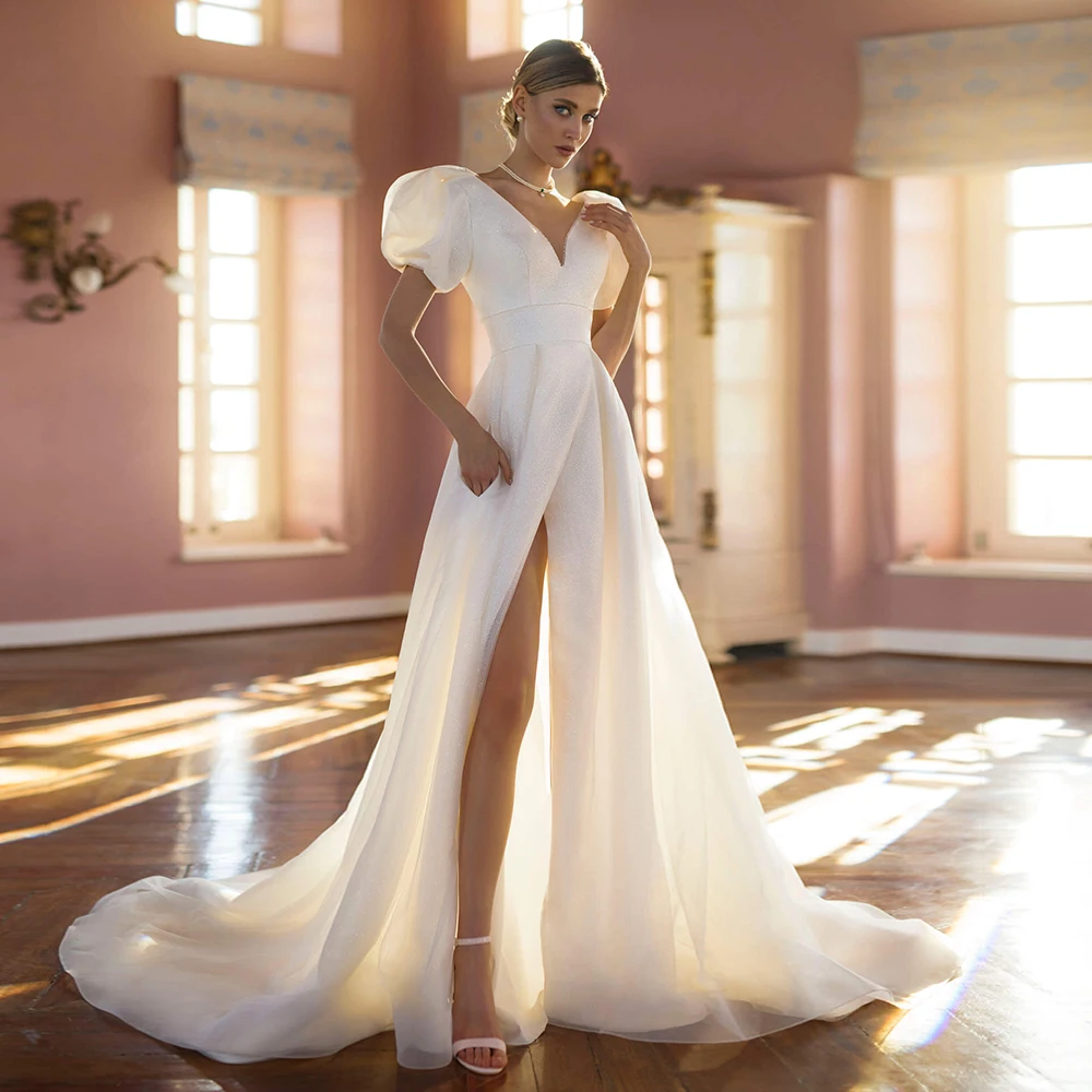 Gelinlik Slit Skirt Elegant Wedding Dress Beading Shiny Vestidos De Novia Short Sleeves Backless Simple Robe Mariage Bridal Gown 
Gelinlik Slit Skirt Elegant Wedding Dress Beading Shiny Vestidos De Novia Short Sleeves Backless Simple Robe Mariage Bridal Gown