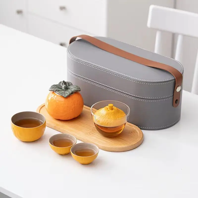 Quick Cup One Pot Two Cup Outdoor Portable Ceramic Glass Kung Fu Tea Set Persimmon Travel Set Chinese Tea Set
Quick Cup One Pot Two Cup Outdoor Portable Ceramic Glass Kung Fu Tea Set Persimmon Travel Set Chinese Tea Set