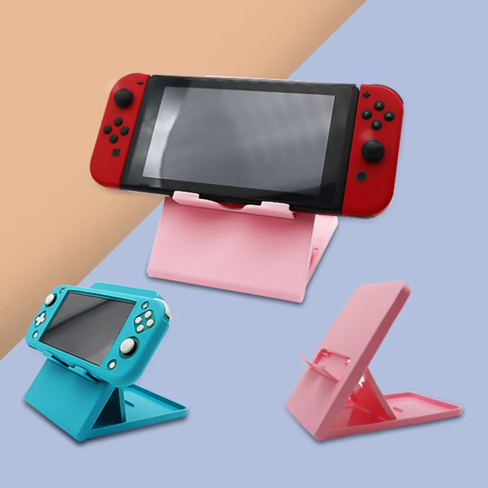 Universal Desktop Stand Mobile Phone Stand Foldable Base Stand for N-Switch Lite Lite Console Game Console Game Accessories
Universal Desktop Stand Mobile Phone Stand Foldable Base Stand for N-Switch Lite Lite Console Game Console Game Accessories