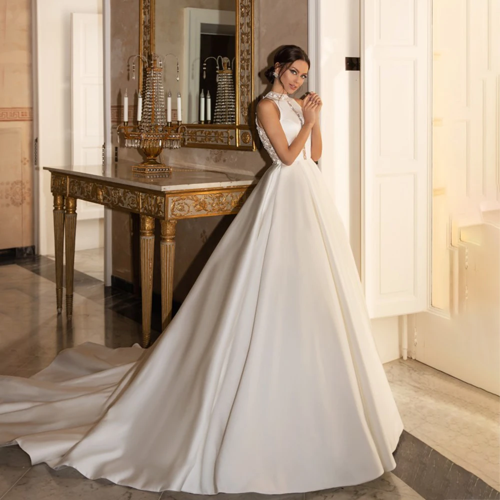 UETEEY A-Line Wedding Dress Sleeveless Buttons Back Court Train Elegant High Neck Satin Wedding Gown 2022 Vestido De Noiva
UETEEY A-Line Wedding Dress Sleeveless Buttons Back Court Train Elegant High Neck Satin Wedding Gown 2022 Vestido De Noiva