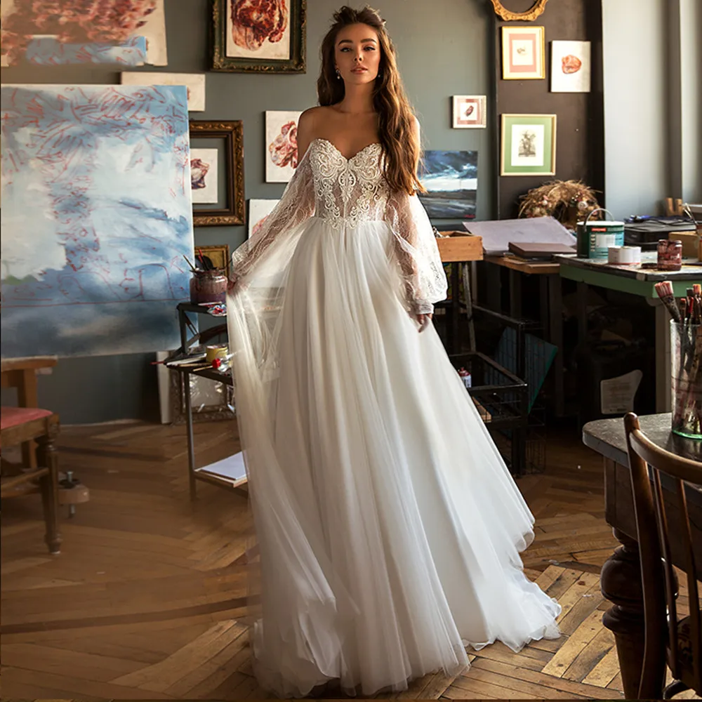 Boho Wedding Dresses Sweetheart Appliques Lace Long Sleeves Floor Length Princess Wedding Gowns Bride Dress 2022 suknia slubna
Boho Wedding Dresses Sweetheart Appliques Lace Long Sleeves Floor Length Princess Wedding Gowns Bride Dress 2022 suknia slubna