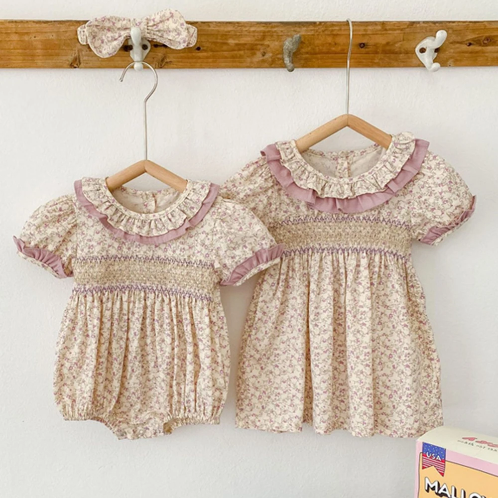 2023 Summer New Sibling Baby Girls Woven Smocked Dress Ruffles Lace Toddler Floral Romper Korean Sister Clothing Suit
2023 Summer New Sibling Baby Girls Woven Smocked Dress Ruffles Lace Toddler Floral Romper Korean Sister Clothing Suit