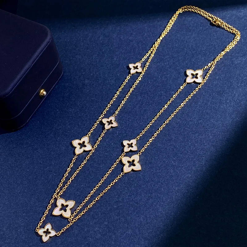 Geometric diamond four leaf flower size double flower white shell long earrings necklace sweater chain
Geometric diamond four leaf flower size double flower white shell long earrings necklace sweater chain