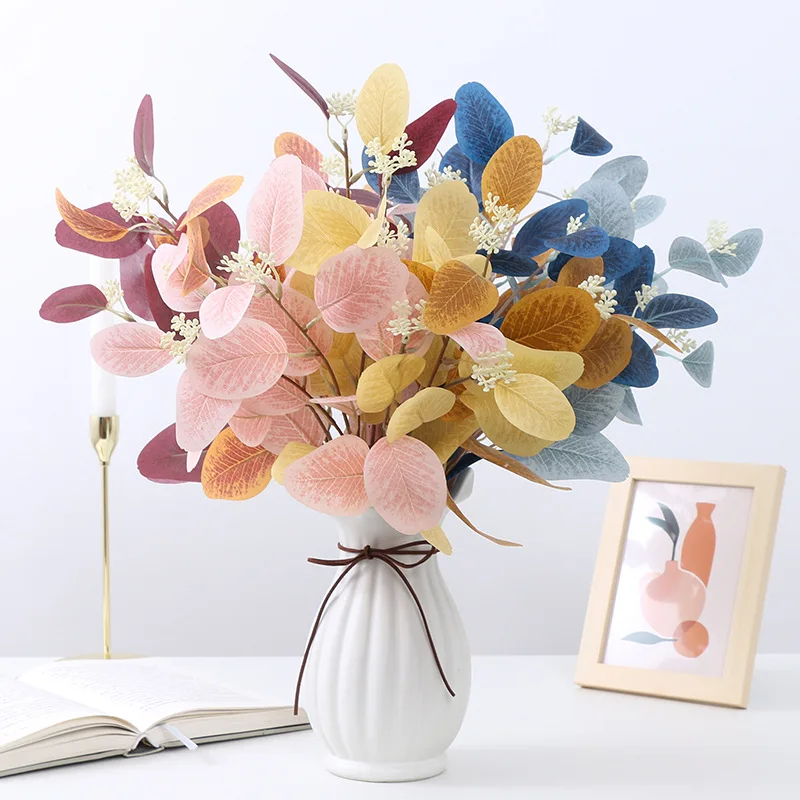 Simulated plant 3-pronged eucalyptus leaves with fruit, home decoration, artificial flower bundle, eucalyptus leaves
Simulated plant 3-pronged eucalyptus leaves with fruit, home decoration, artificial flower bundle, eucalyptus leaves
