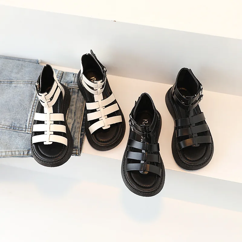 Kids Cross Weaving Narrow Band Sandalias Mujer Ankle Buckle Flats Slippers Vintage Cut-out Gladiator Sandals for Teenagers Girls
Kids Cross Weaving Narrow Band Sandalias Mujer Ankle Buckle Flats Slippers Vintage Cut-out Gladiator Sandals for Teenagers Girls