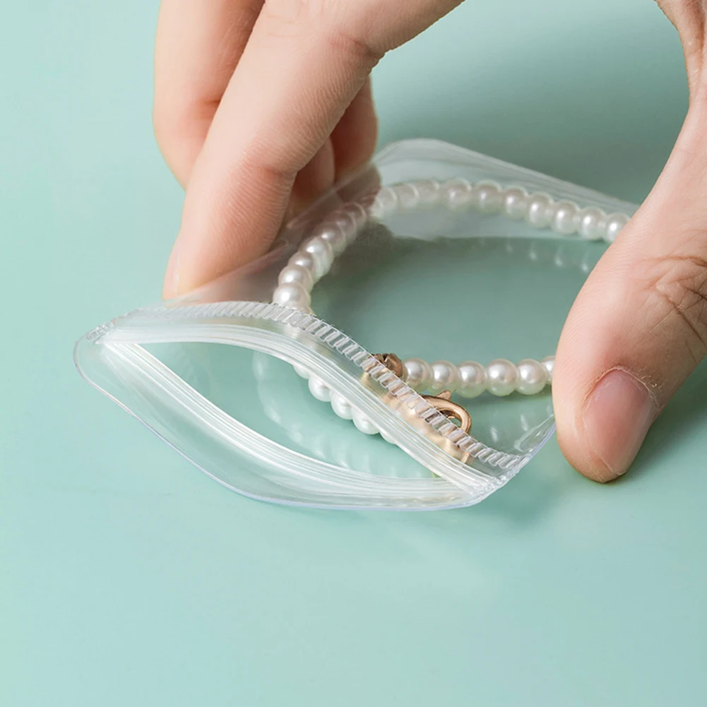 Transparent Jewelry Storage Bag PVC Display Holder Earrings Anti-oxidation Transparent Dust-proof Storage Bag Jewelry Booklet
Transparent Jewelry Storage Bag PVC Display Holder Earrings Anti-oxidation Transparent Dust-proof Storage Bag Jewelry Booklet