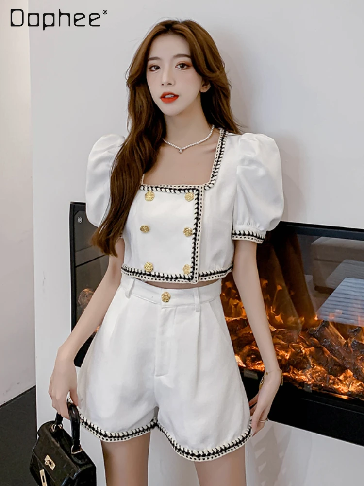 Женский костюм с коротким рукавом, двубортный топ с пышными рукавами и шорты с высокой талией, комплект из двух предметов, лето 2022 
Женский костюм с коротким рукавом, двубортный топ с пышными рукавами и шорты с высокой талией, комплект из двух предметов, лето 2022