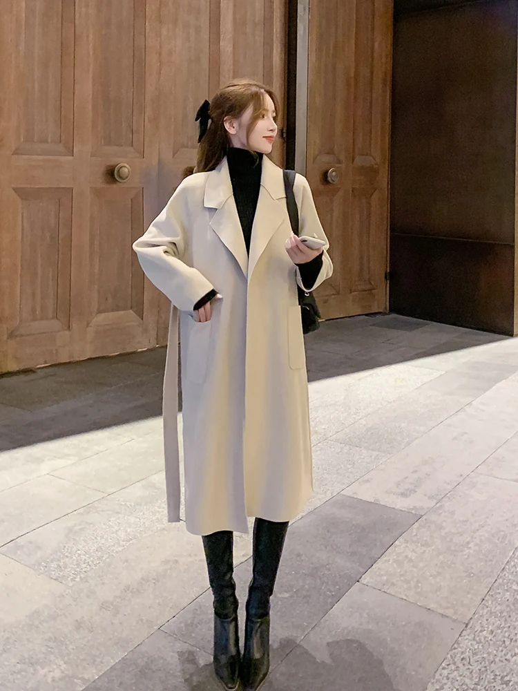 Windbreaker women's all-match casual and comfortable spring and autumn temperament was thin knee-length coat with long sleeves 
Windbreaker women's all-match casual and comfortable spring and autumn temperament was thin knee-length coat with long sleeves