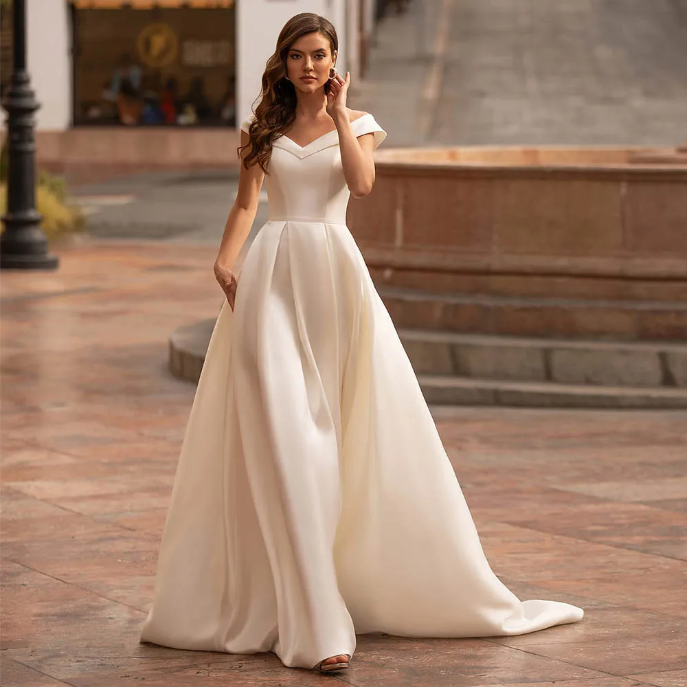 Simple Wedding Dress 2022 Cap Sleeves Sheer Bateau Buttons Illusion Bridal Gowns A Line Sweep Train Draped Outdoor Wedding Gown
Simple Wedding Dress 2022 Cap Sleeves Sheer Bateau Buttons Illusion Bridal Gowns A Line Sweep Train Draped Outdoor Wedding Gown