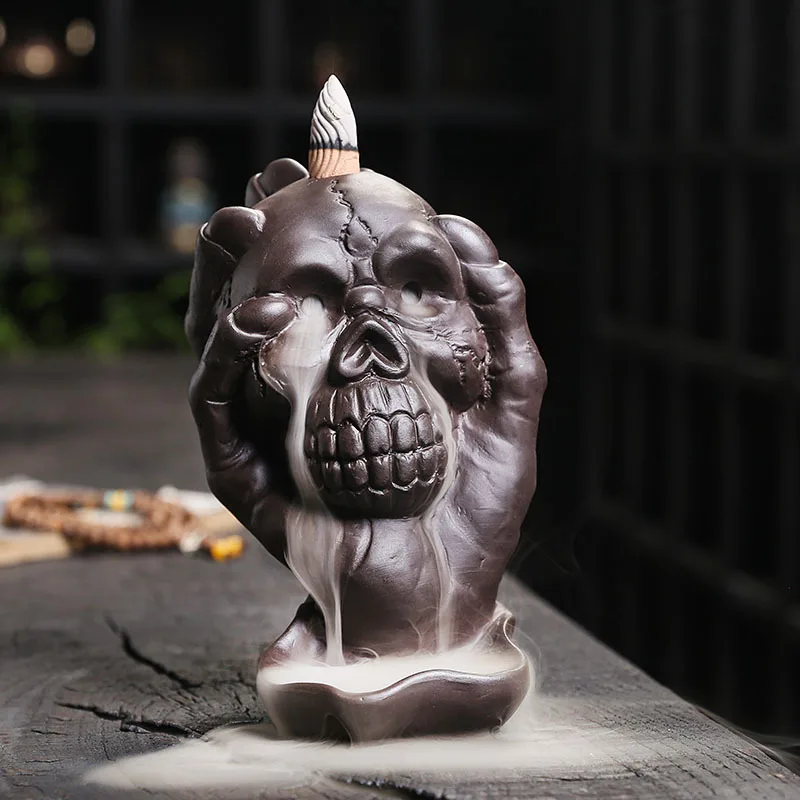 Purple sand incense burner creative skull Halloween ghost hand home decoration
Purple sand incense burner creative skull Halloween ghost hand home decoration