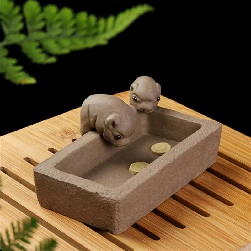 Purple Clay Tea Pet Tea Pet Ornaments Chinese Crude Pottery Pig Trough Sculpture Tea Pet Little Pigs Drink Water Tea Pet 
Purple Clay Tea Pet Tea Pet Ornaments Chinese Crude Pottery Pig Trough Sculpture Tea Pet Little Pigs Drink Water Tea Pet