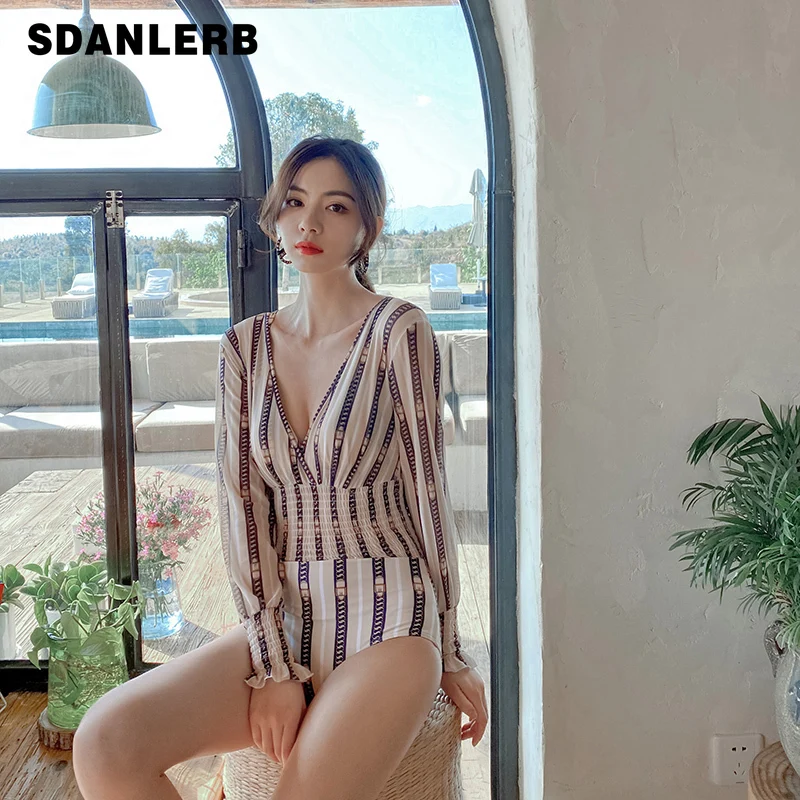 Women's Summer Swimsuit New V-neck Bathing Suit Long Sleeve One-Piece Sun Protection Bikini Simple Hot Spring Seaside Clothing
Women's Summer Swimsuit New V-neck Bathing Suit Long Sleeve One-Piece Sun Protection Bikini Simple Hot Spring Seaside Clothing