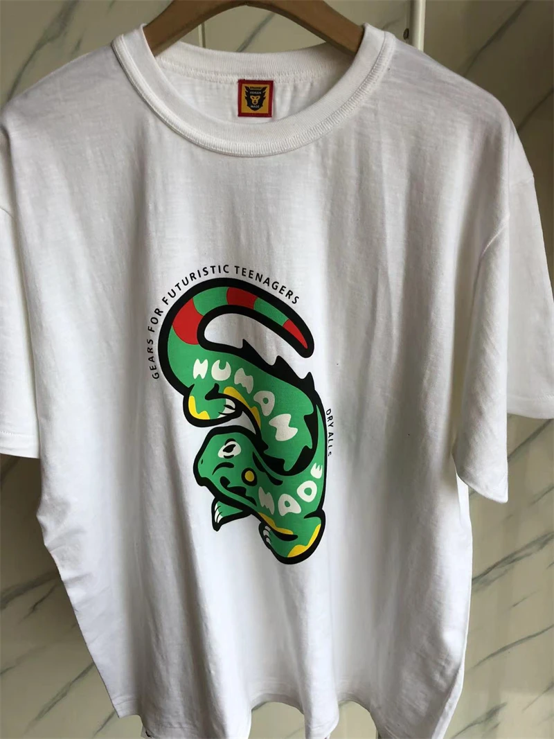 Top Version Cartoon Lizard Print Human Made Men Women Short Sleeve T-shirts Casual O-Neck Top Tees Kanye West
Top Version Cartoon Lizard Print Human Made Men Women Short Sleeve T-shirts Casual O-Neck Top Tees Kanye West