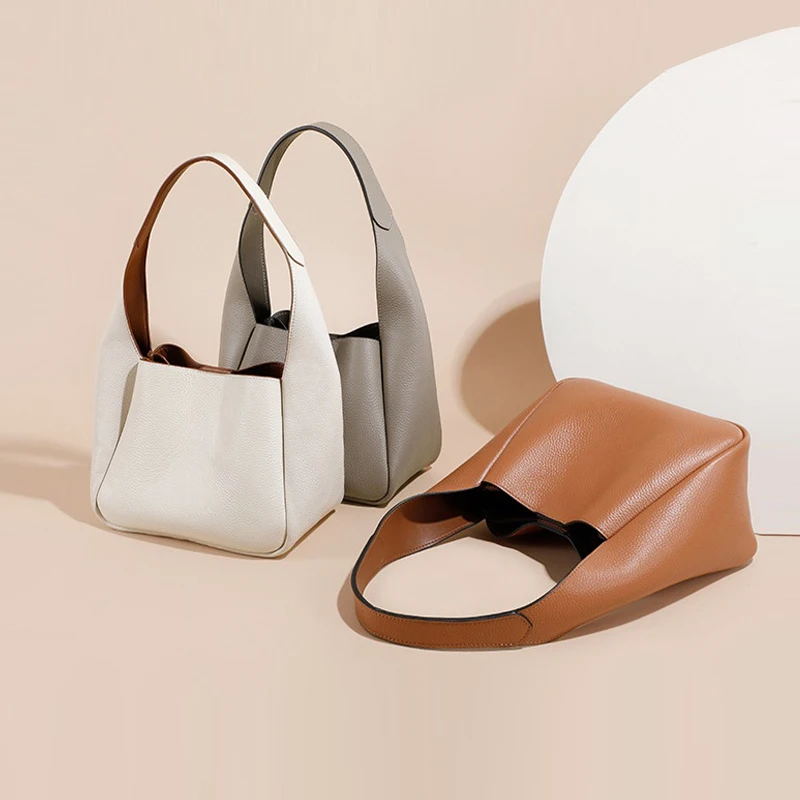 Genuine Leather Women's Bag First Layer Cowhide Bucket Cabbage Basket Bag All-match Commuter Armpit Bag
Genuine Leather Women's Bag First Layer Cowhide Bucket Cabbage Basket Bag All-match Commuter Armpit Bag