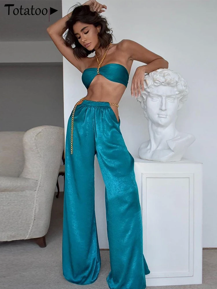 Totatoop Fashion Metal Chain Halter Crop Top And Wide Leg Pants Set Satin 2 Piece Sets Women Outfits Party Club Matching Sets
Totatoop Fashion Metal Chain Halter Crop Top And Wide Leg Pants Set Satin 2 Piece Sets Women Outfits Party Club Matching Sets
