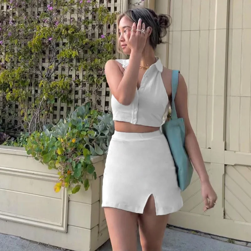 2 Piece Sets Womens Outfits Summer Bandage Polo Collar Crop Top Button Top Slit Skirt Women 2022 Casual Simple Mini Skirt Suits
2 Piece Sets Womens Outfits Summer Bandage Polo Collar Crop Top Button Top Slit Skirt Women 2022 Casual Simple Mini Skirt Suits
