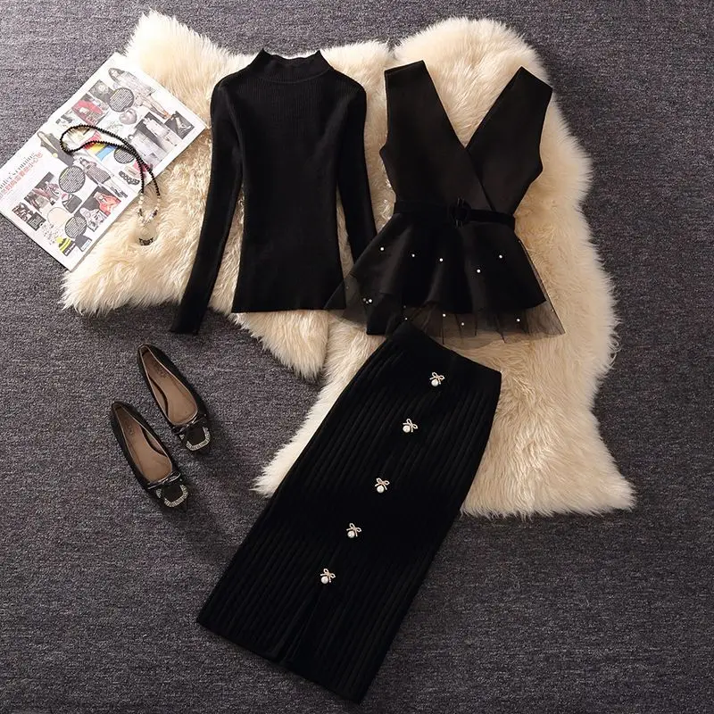 2023 Autumn Winter New Women's Sweater Set Korean Fashion Beading Mesh Lace-up Ruffled Vest Black Jumpers Mid-calf Skirts Sets
2023 Autumn Winter New Women's Sweater Set Korean Fashion Beading Mesh Lace-up Ruffled Vest Black Jumpers Mid-calf Skirts Sets