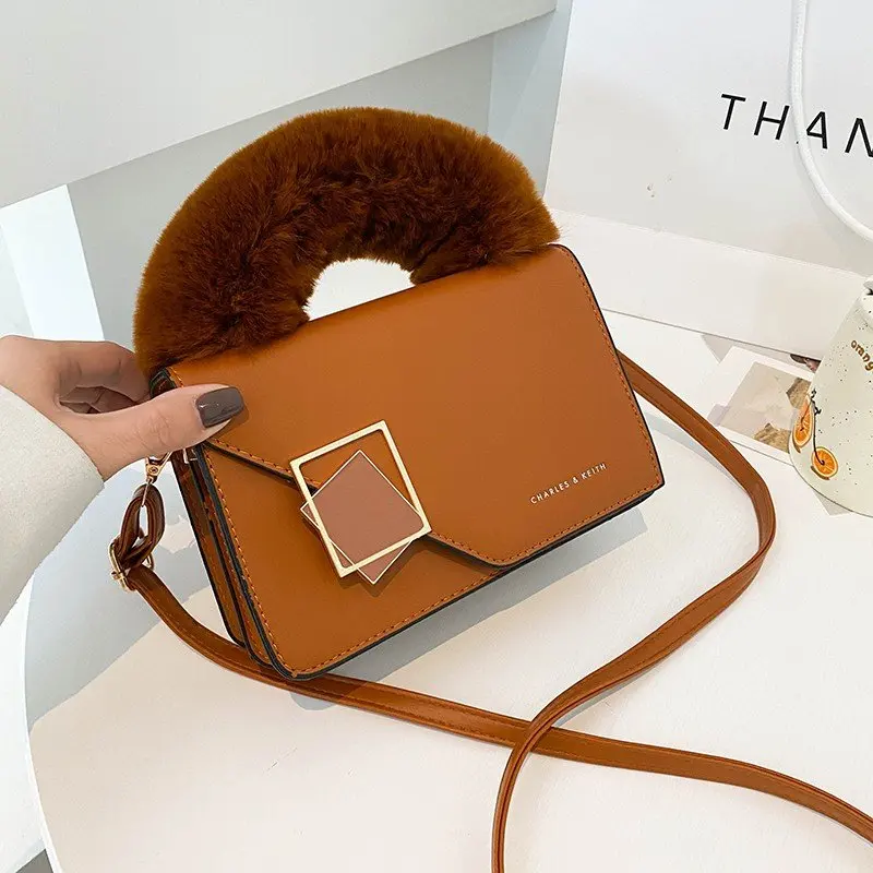2022 new female PU leather handbag designer shoulder messenger bag fashion brand fur handbag
2022 new female PU leather handbag designer shoulder messenger bag fashion brand fur handbag