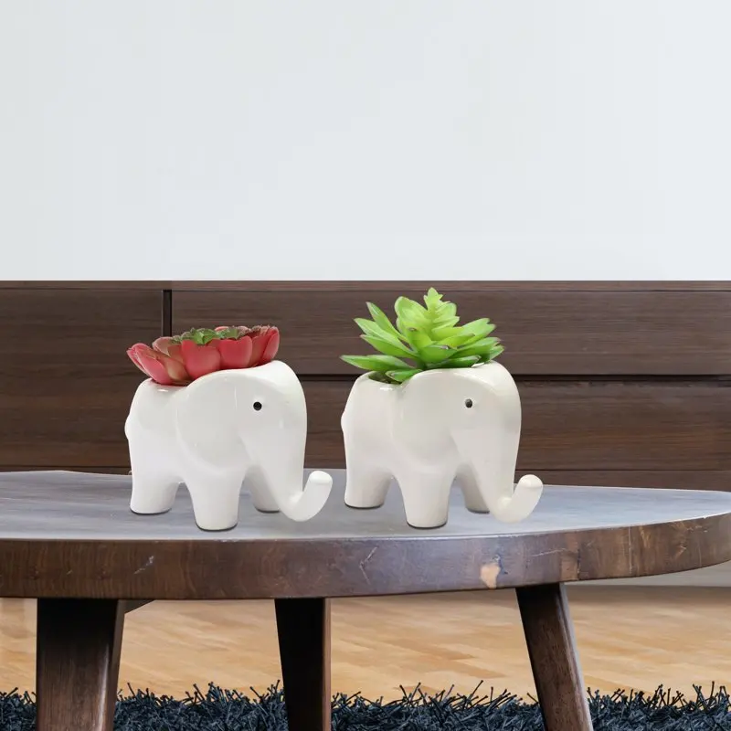 Mark 4.75”H Artificial Succulents in White Elephant Shaped Ceramic Pot – 2 Pack Assorted
Mark 4.75”H Artificial Succulents in White Elephant Shaped Ceramic Pot – 2 Pack Assorted
