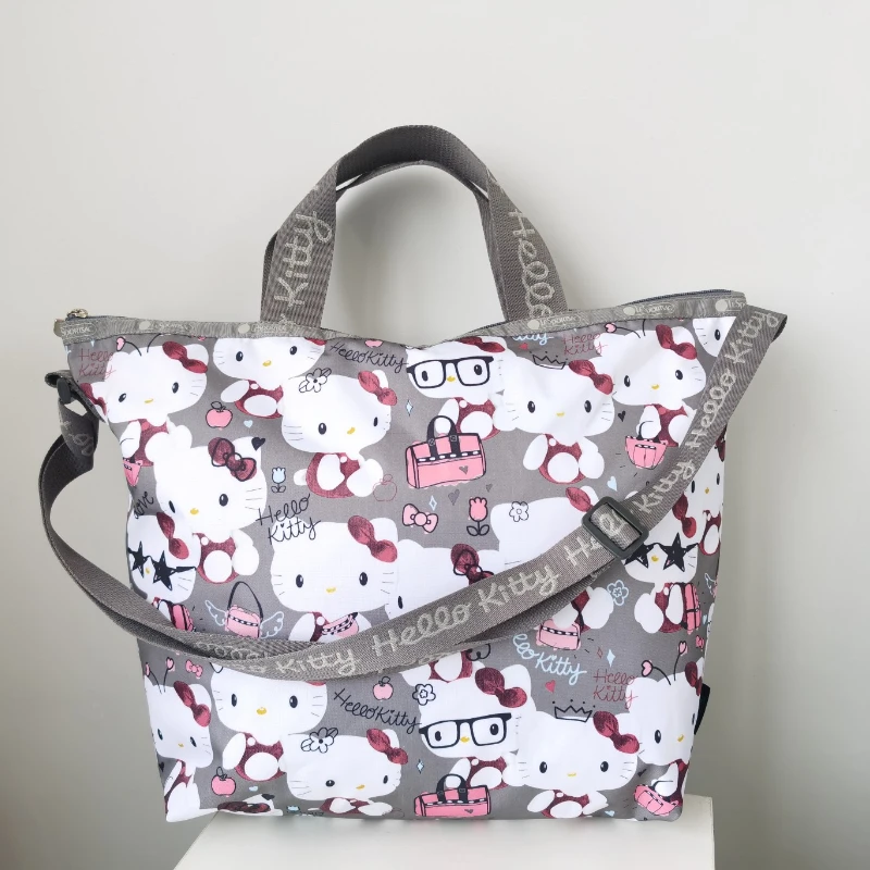 Kawaii Hello Kitty новая сумка, модная повседневная сумка-мессенджер через плечо с принтом, дорожный рюкзак, Женские аниме сумки для девушек, рюкзак
Kawaii Hello Kitty новая сумка, модная повседневная сумка-мессенджер через плечо с принтом, дорожный рюкзак, Женские аниме сумки для девушек, рюкзак