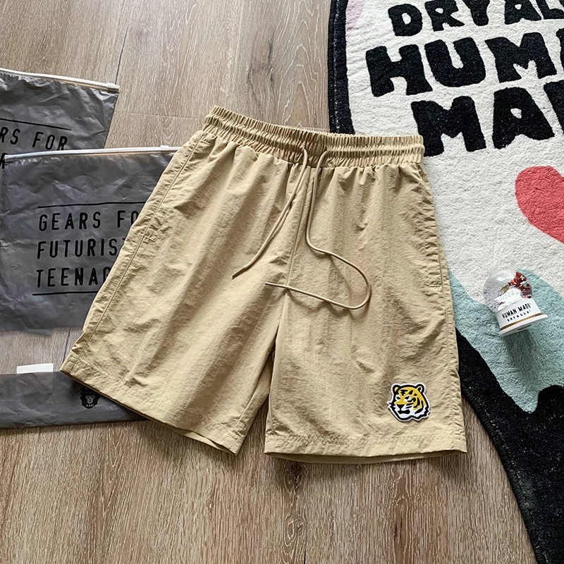 Human Made Men's Shorts Oversized Beach Shorts Men's Women's HUMAN MADE Tiger Embroidered Casual Shorts
Human Made Men's Shorts Oversized Beach Shorts Men's Women's HUMAN MADE Tiger Embroidered Casual Shorts