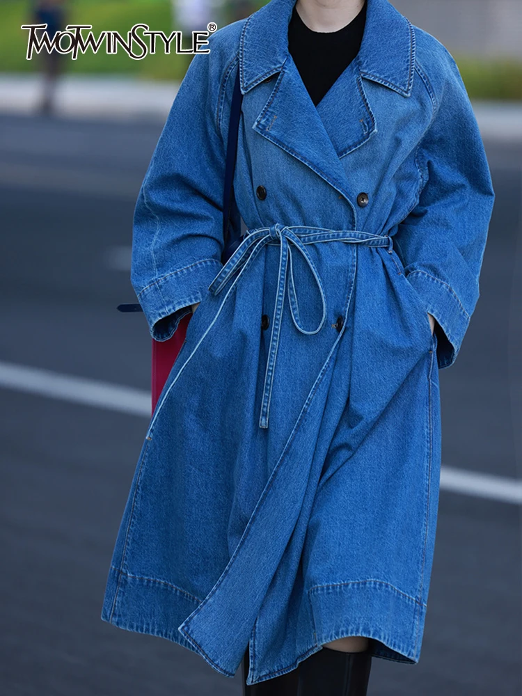 TWOTWINSTYLE Casual Denim Windbreakers For Women Lapel Long Sleeves High Waist Patchwork Lace Up Temperament Trench Female 2023
TWOTWINSTYLE Casual Denim Windbreakers For Women Lapel Long Sleeves High Waist Patchwork Lace Up Temperament Trench Female 2023