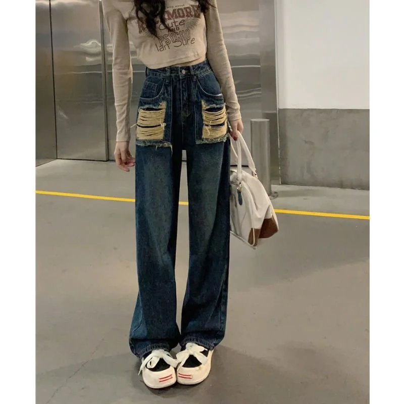 Весенние женские брюки, новинка 2023, ретро-американские джинсы с высокой талией для женщин, с асимметричными и сломанными дырками, широкие штаны для пола
Весенние женские брюки, новинка 2023, ретро-американские джинсы с высокой талией для женщин, с асимметричными и сломанными дырками, широкие штаны для пола