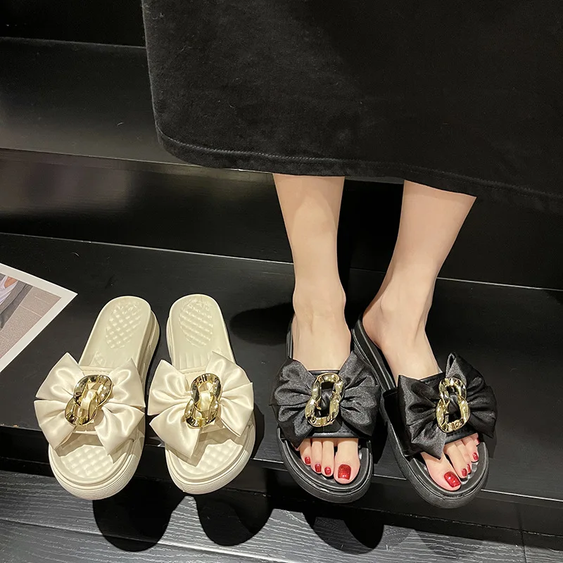 Casual sandals and slippers women's summer outer wear 2022 new fashion chain sponge cake thick bottom bow one word slippers
Casual sandals and slippers women's summer outer wear 2022 new fashion chain sponge cake thick bottom bow one word slippers