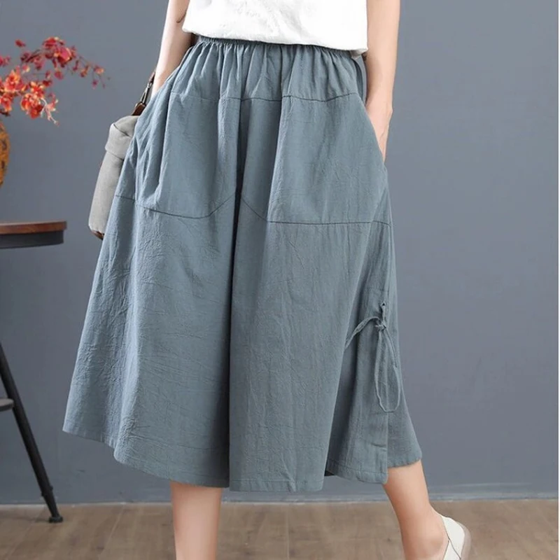 Fashion Loose Bloomers Pants Women Summer Casual Elastic Waist Wide Leg Pants Korean Female Solid Color OL Calf-length Pants New
Fashion Loose Bloomers Pants Women Summer Casual Elastic Waist Wide Leg Pants Korean Female Solid Color OL Calf-length Pants New