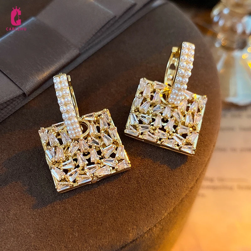 Роскошные Жемчужные квадратные серьги Стразы с подвеской, серьги-кольца Huggie, французская мода, темпераментные серьги для женщин, ювелирные ...
Роскошные Жемчужные квадратные серьги Стразы с подвеской, серьги-кольца Huggie, французская мода, темпераментные серьги для женщин, ювелирные ...