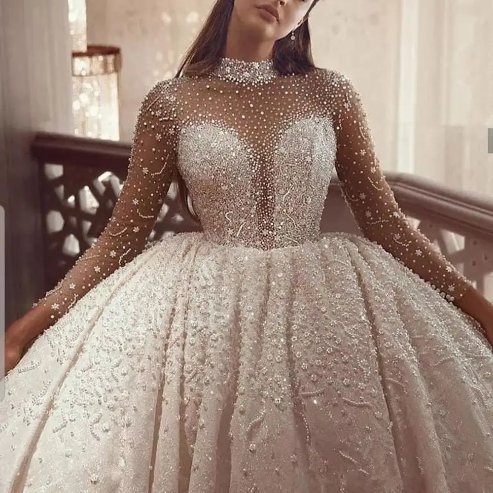 Luxurious Sexy Gorgeous Wedding Dresses Beaded Pearls Bridal Dresses Long Sleeves Wedding Gowns 2022
Luxurious Sexy Gorgeous Wedding Dresses Beaded Pearls Bridal Dresses Long Sleeves Wedding Gowns 2022