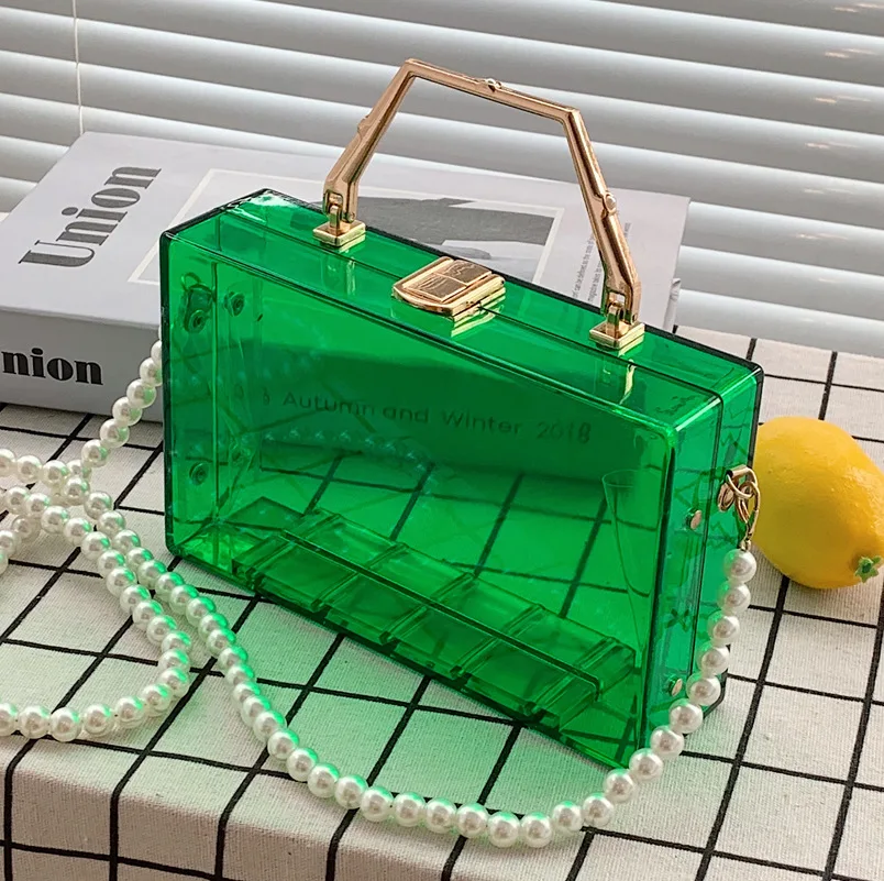 Acrylic Box Handbags For Women Metal Handle Lock Pearl Chain Shoulder Bag 2022 Luxury Designer Purses Transparent Crossbody Bag
Acrylic Box Handbags For Women Metal Handle Lock Pearl Chain Shoulder Bag 2022 Luxury Designer Purses Transparent Crossbody Bag
