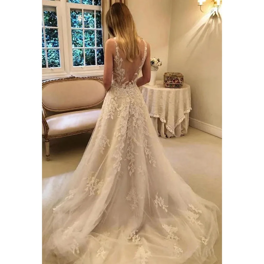 Applique Wedding Dress A Line V Neck Backless Sexy Boho Wedding Dresses Princess Sleeveless Court Train Illusion Bridal Gowns
Applique Wedding Dress A Line V Neck Backless Sexy Boho Wedding Dresses Princess Sleeveless Court Train Illusion Bridal Gowns