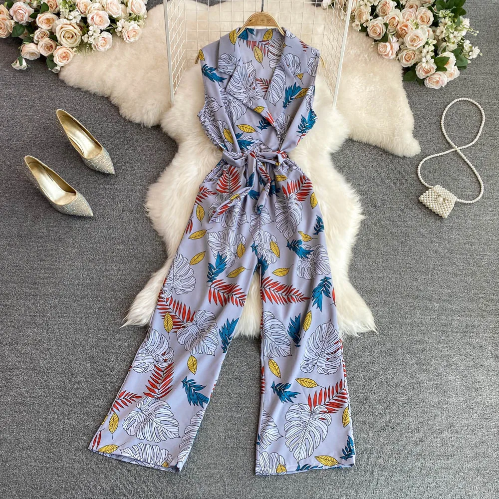 New Summer Women Beach Holiday Sleeveless Suit Collar Print Jumpsuit Fashion Lace-up Slim Temperament Chiffon Wide Leg Jumpsuit
New Summer Women Beach Holiday Sleeveless Suit Collar Print Jumpsuit Fashion Lace-up Slim Temperament Chiffon Wide Leg Jumpsuit
