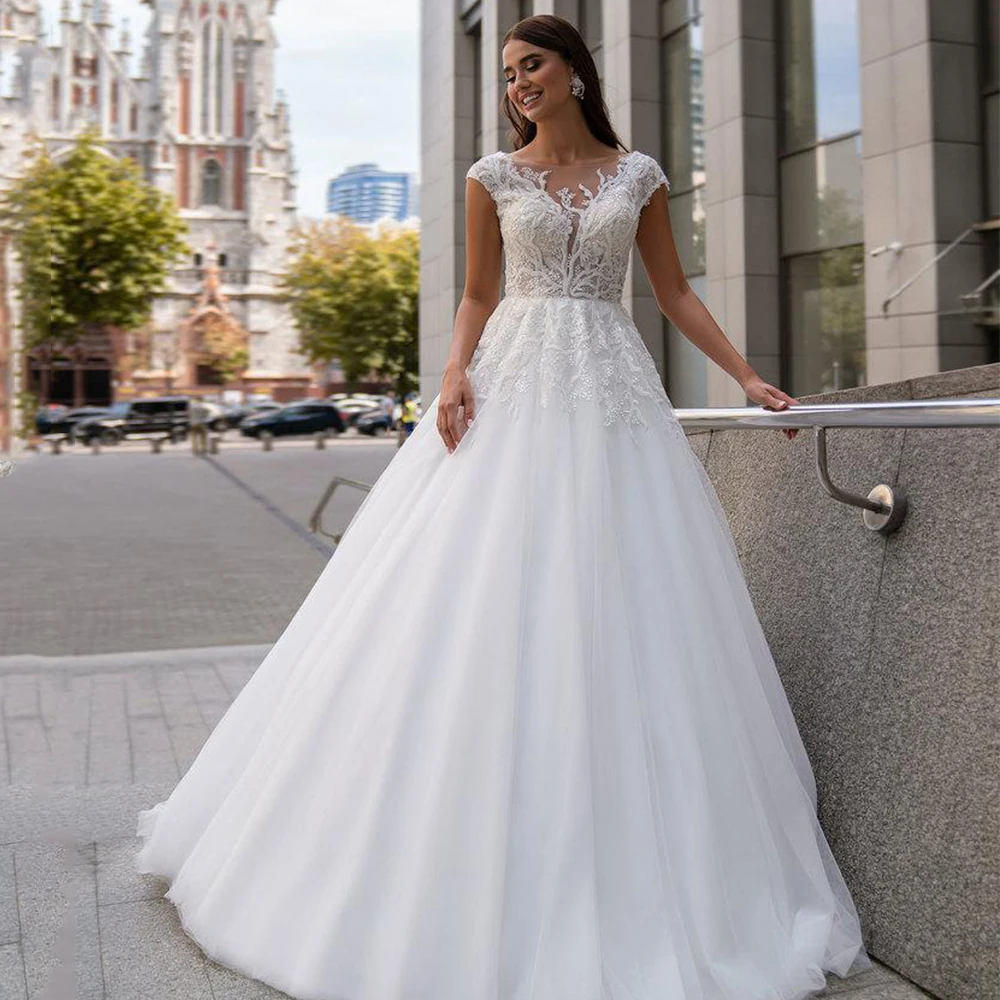 Classic Wedding Dresses O-Neck Lace Applique Short Sleeves Lace Up Backless Bride Gowns A-Line Sweep Train Vestido De Noiva
Classic Wedding Dresses O-Neck Lace Applique Short Sleeves Lace Up Backless Bride Gowns A-Line Sweep Train Vestido De Noiva