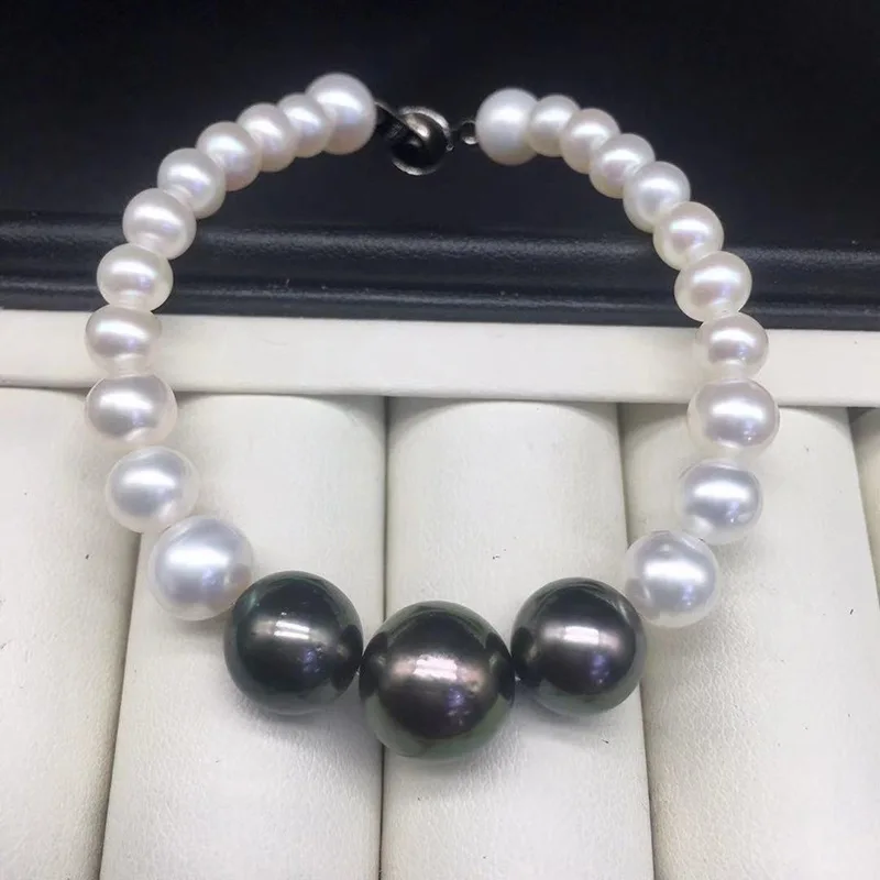 Elegant High-end 7.5" White 7-8mm Black 10-11mm Natural South Sea Genuine Round Pearl Bracelet Woman Free Shipping Ball Clasp
Elegant High-end 7.5" White 7-8mm Black 10-11mm Natural South Sea Genuine Round Pearl Bracelet Woman Free Shipping Ball Clasp