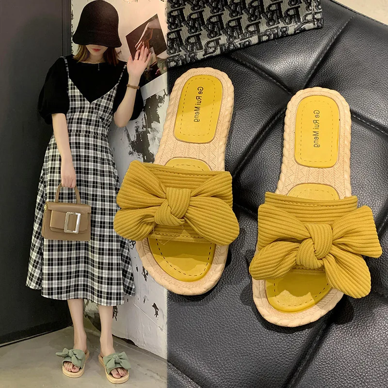 Slippers Women's Summer Wear Ins Trendy Fashion Korean Version Bow One Word Sandals Women's Summer Party Shoes for Women 
Slippers Women's Summer Wear Ins Trendy Fashion Korean Version Bow One Word Sandals Women's Summer Party Shoes for Women