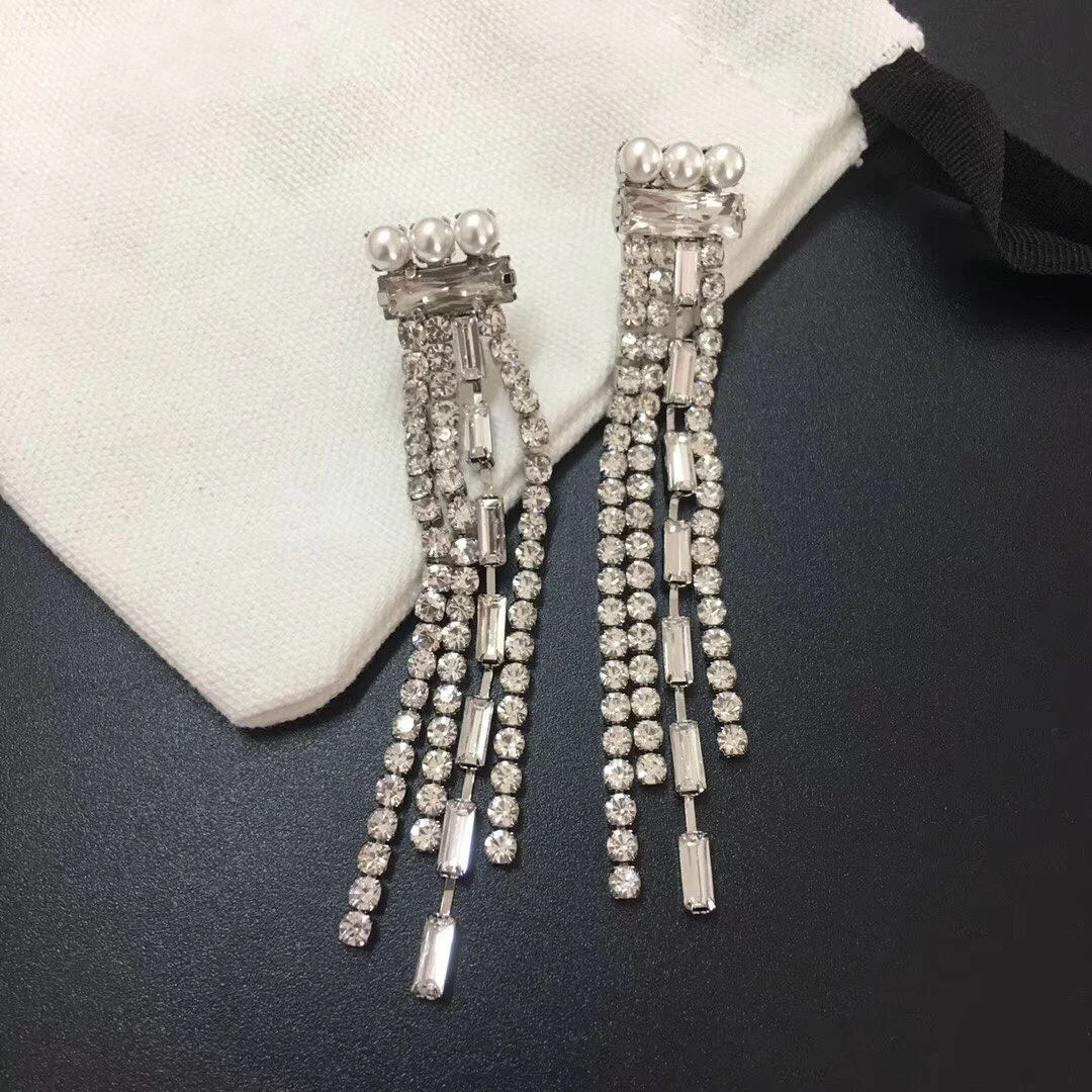 European and American fashion personality tassel crystal earrings
European and American fashion personality tassel crystal earrings