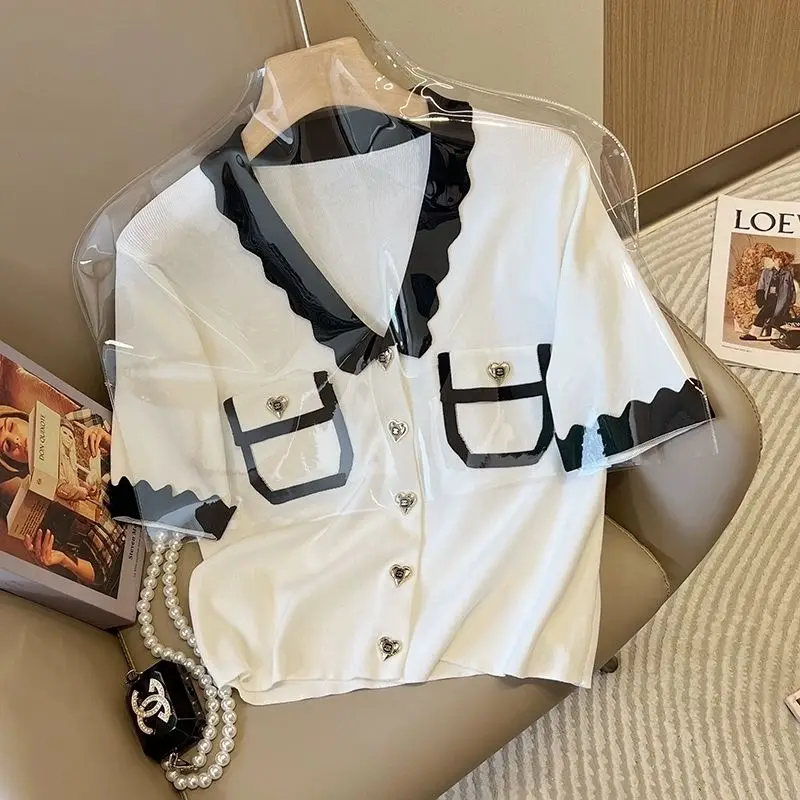 Black And White Short Sleeve Knitted Cardigan Women's Summer Thin Fashion Short Top
Black And White Short Sleeve Knitted Cardigan Women's Summer Thin Fashion Short Top