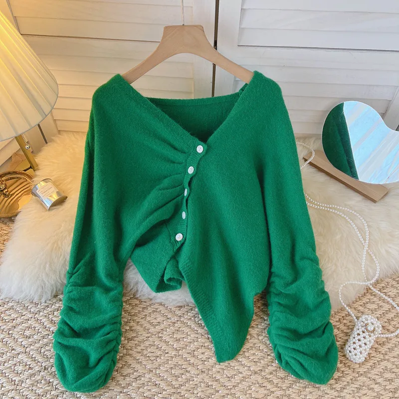 Autumn V-neck knit shirt women's pleated long sleeve diagonal breasted sweater solid color irregular Cardigan girl sexy top
Autumn V-neck knit shirt women's pleated long sleeve diagonal breasted sweater solid color irregular Cardigan girl sexy top