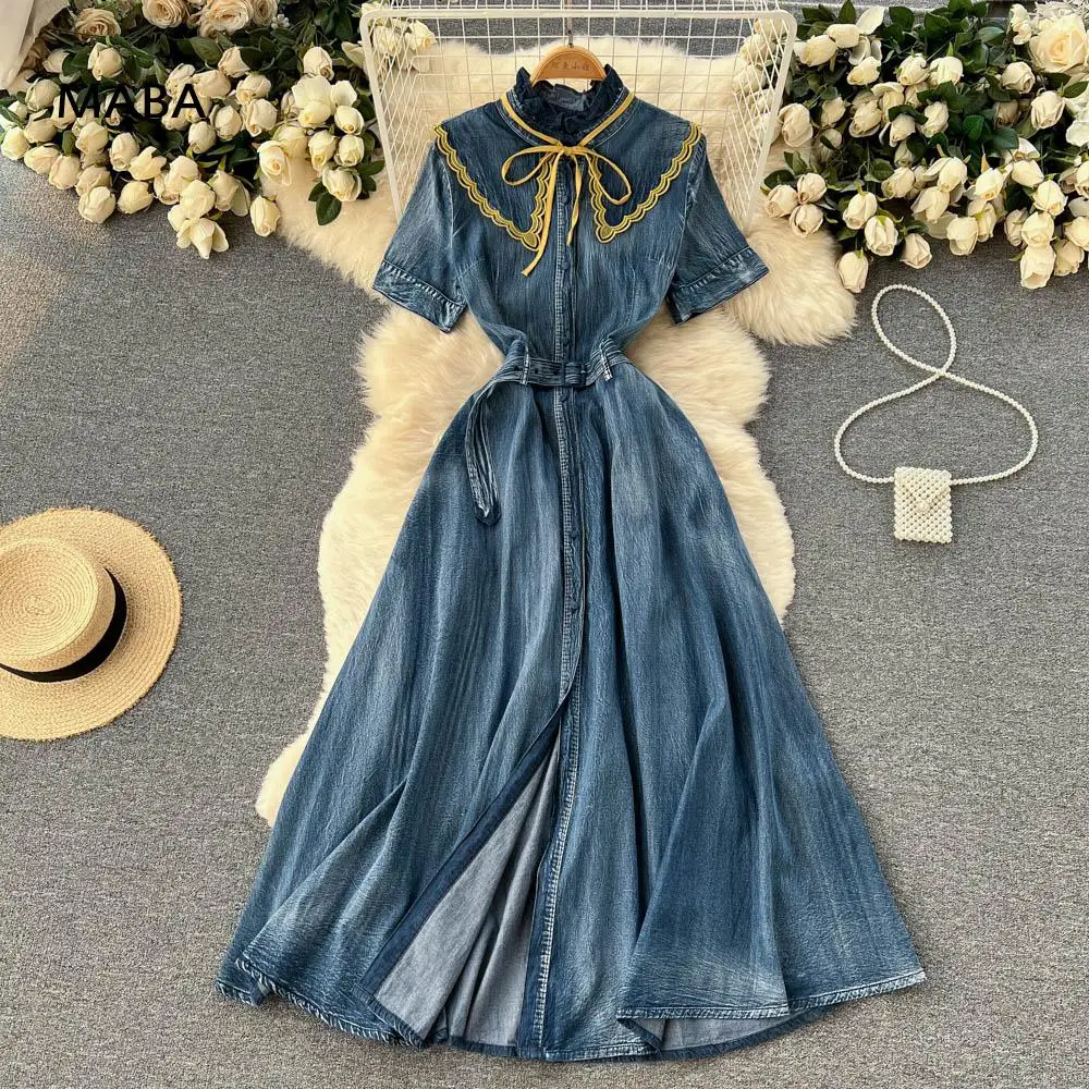 High Quality Denim Dress Women Summer New Stand Collar Short Sleeve Blue Single Breasted Jeans Big Swing Bandage Maxi Dress 2022
High Quality Denim Dress Women Summer New Stand Collar Short Sleeve Blue Single Breasted Jeans Big Swing Bandage Maxi Dress 2022