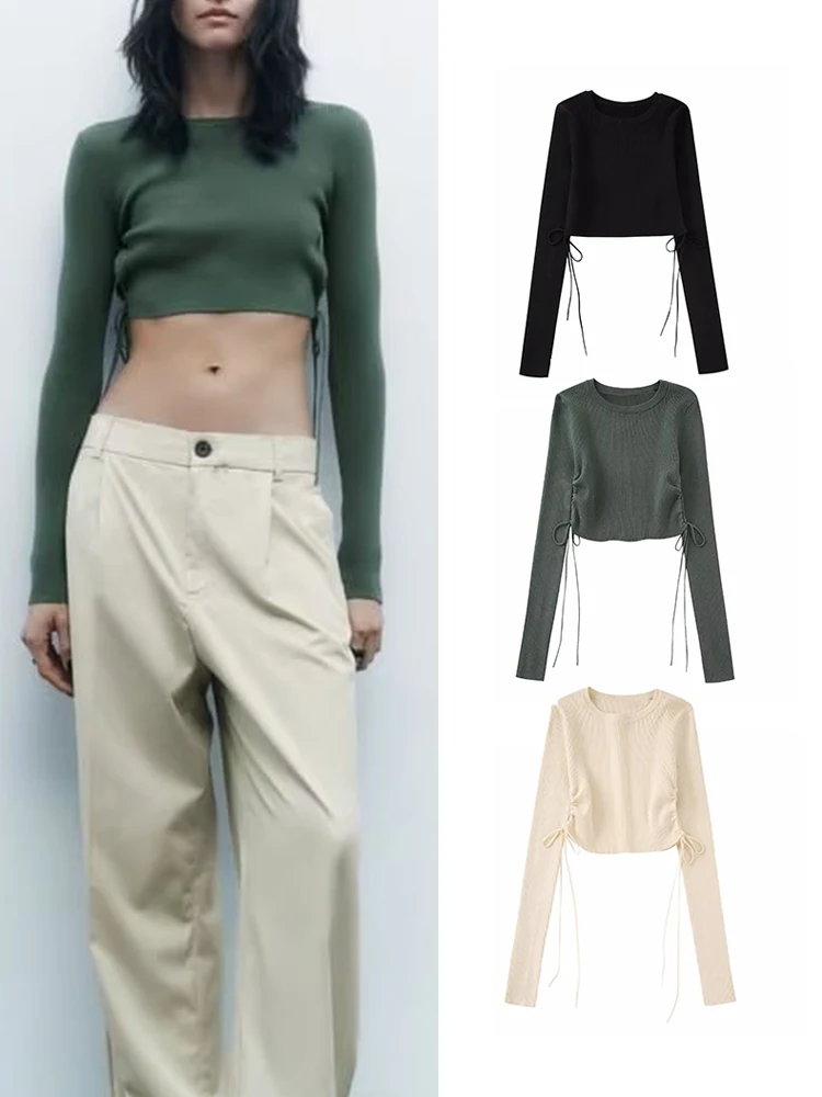 Женский трикотажный свитер с вырезами, круглым вырезом и длинным рукавом
Женский трикотажный свитер с вырезами, круглым вырезом и длинным рукавом