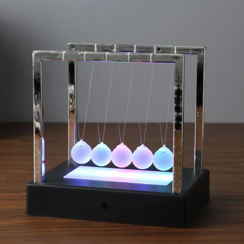15cm Newton Pendulum Ornaments Luminous Newton Billiards Touch Ball Creative Home Desktop Decor Ornaments World Cup Gift 2022
15cm Newton Pendulum Ornaments Luminous Newton Billiards Touch Ball Creative Home Desktop Decor Ornaments World Cup Gift 2022