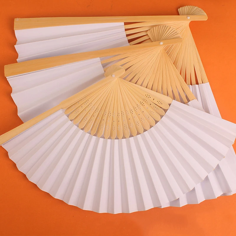 white hand-painted foldable paper fan portable party wedding supplies hand fan gift decoration wedding fans Chinese decoration 
white hand-painted foldable paper fan portable party wedding supplies hand fan gift decoration wedding fans Chinese decoration