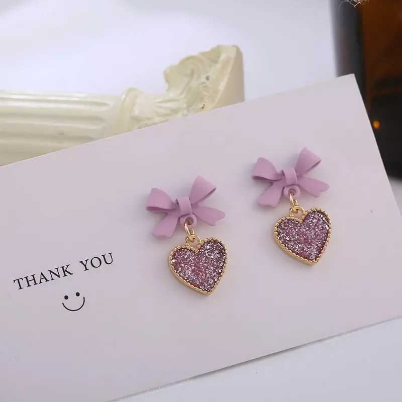 Cute Korean Earrings Heart Bling Zircon Stone Purple Bow Stud Earrings for Women Girls Fashion Jewelry 2021 New Gift
Cute Korean Earrings Heart Bling Zircon Stone Purple Bow Stud Earrings for Women Girls Fashion Jewelry 2021 New Gift