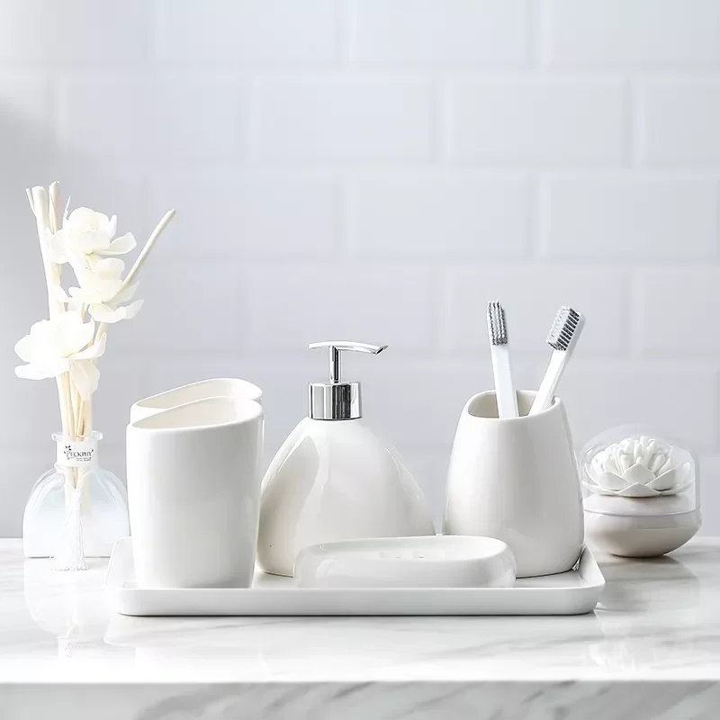 White ceramic bathroom equipment Hotel bathroom Toiletries mouthwash cup Bath bottle Bathroom toiletries kit
White ceramic bathroom equipment Hotel bathroom Toiletries mouthwash cup Bath bottle Bathroom toiletries kit