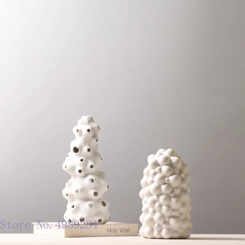 Ceramic Handicraft Ornaments Coral White Ceramic Vase Hollow Flower Vase Abstract Irregular Bump Furnishings Flower Arrangement
Ceramic Handicraft Ornaments Coral White Ceramic Vase Hollow Flower Vase Abstract Irregular Bump Furnishings Flower Arrangement