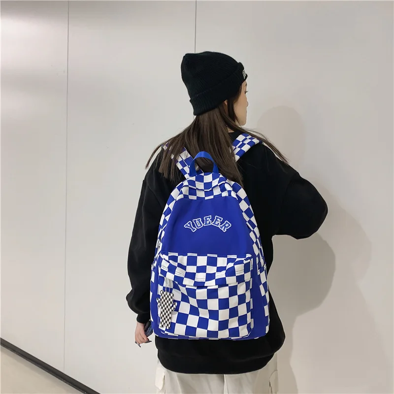 2022 spring new Korean version street trend male and female students nylon schoolbag fashion plaid casual backpack
2022 spring new Korean version street trend male and female students nylon schoolbag fashion plaid casual backpack