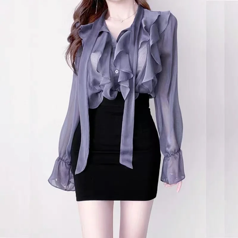 Korean Chic Ruffled Blouse Women Summer Temperament Flare Sleeve Translucent Chiffon Shirt OL Style Elegant Ladies Femme Blusas
Korean Chic Ruffled Blouse Women Summer Temperament Flare Sleeve Translucent Chiffon Shirt OL Style Elegant Ladies Femme Blusas